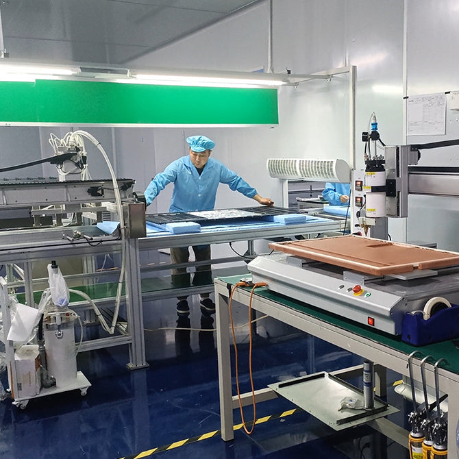 R&D team of GFF is testing the portable TV on wheels in the laboratory.