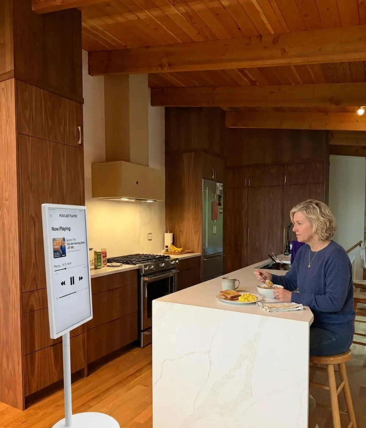 breakfast with a portable smart screen on wheels playing podcast